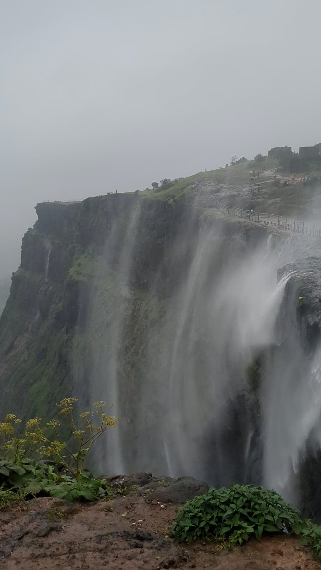 The reverse waterfall at Naneghat: spray blown back up over the cliff edge